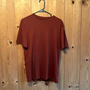 Banana Republic medium luxury torch performance. Dark copper